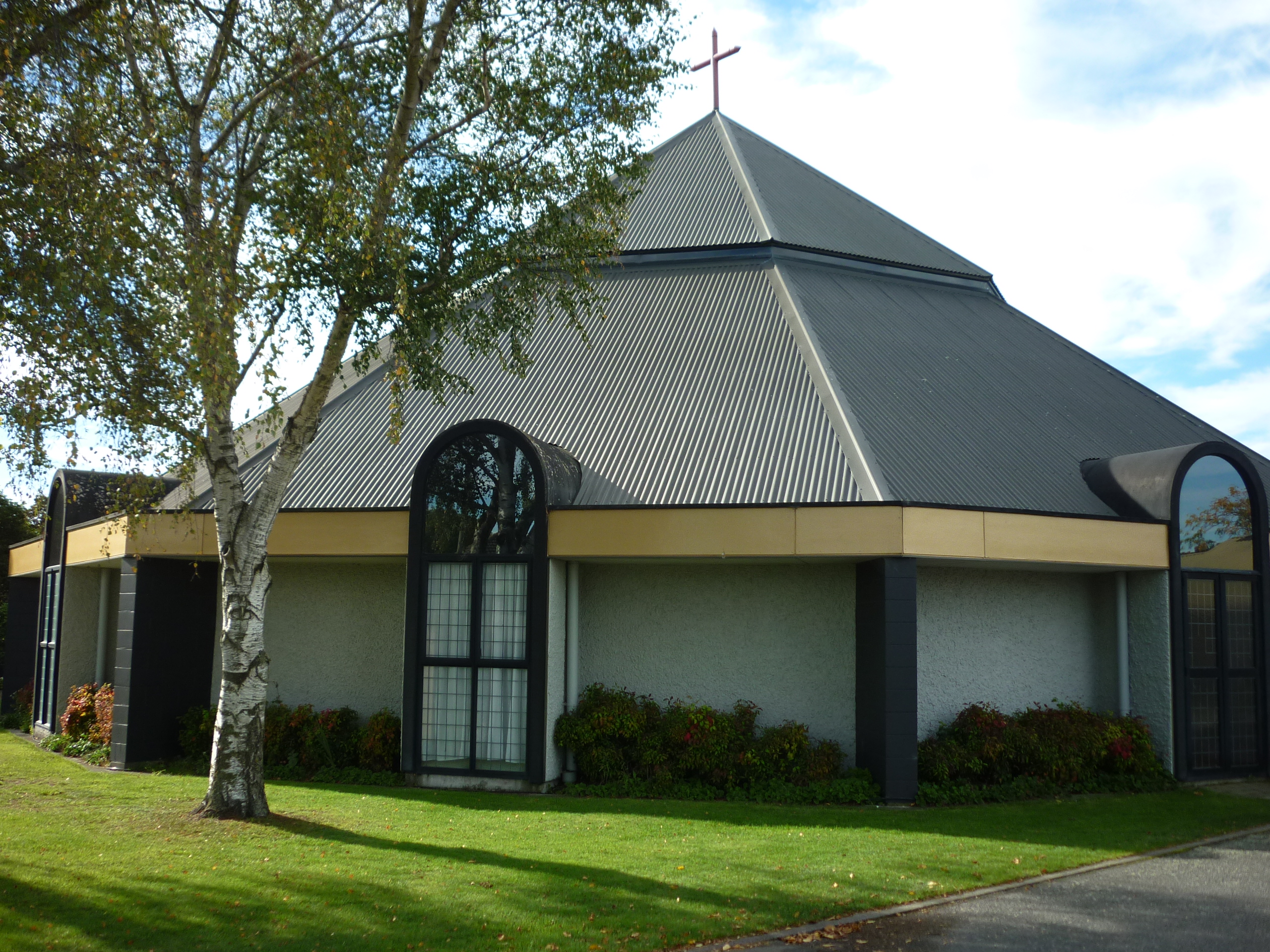 Church front with tree